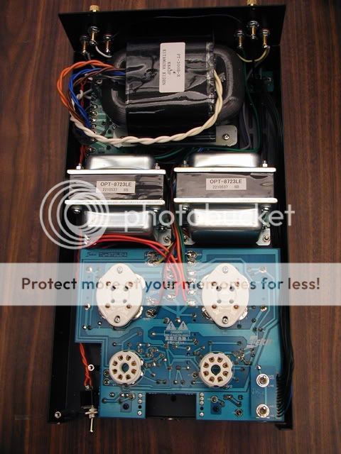 Main circuit card with connections soldered to output transformer